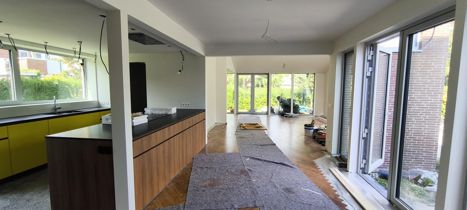 Large glazed opening in a renovated interior